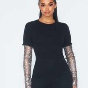 Black jumper with net material arms sparkling